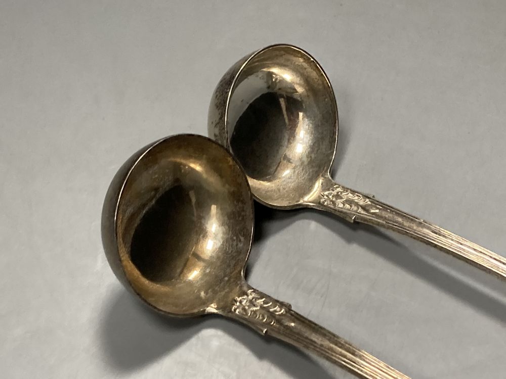 A pair of William IV Scottish silver Queens pattern sauce ladles, John Muir, Glasgow, 1833, 17.2cm, 3oz.